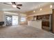 Spacious kitchen with granite countertops and stainless steel appliances at 10923 W Escuda Dr, Sun City, AZ 85373