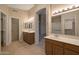 Double vanity bathroom with separate shower at 10923 W Escuda Dr, Sun City, AZ 85373