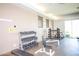 Community weight room with dumbbells and machines at 10923 W Escuda Dr, Sun City, AZ 85373