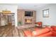 Community library and comfortable lounge area with fireplace at 10923 W Escuda Dr, Sun City, AZ 85373