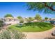 Enjoy a picnic on the artificial turf at 10923 W Escuda Dr, Sun City, AZ 85373