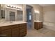 Double vanity bathroom with a bathtub at 10923 W Escuda Dr, Sun City, AZ 85373