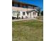 Exterior view of condo building with landscaping at 8211 E Garfield St # J118, Scottsdale, AZ 85257