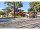 House exterior with a fountain, landscaping, and three-car garage at 4112 W Paradise Ln, Phoenix, AZ 85053