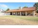 Home exterior showcasing a covered patio and pool at 4112 W Paradise Ln, Phoenix, AZ 85053