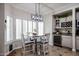 Breakfast nook with built-in cabinetry and window seat at 4112 W Paradise Ln, Phoenix, AZ 85053