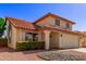 Two-story house with a tile roof and landscaped front yard at 5971 W Venus Way, Chandler, AZ 85226
