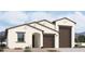 Two-story home with a modern design, two-car garage, and desert landscaping at 2690 E Abe Truckle Ave, San Tan Valley, AZ 85140