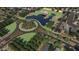 Aerial view of the community's common area, including a pond and playground at 2690 E Abe Truckle Ave, San Tan Valley, AZ 85140