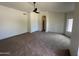 Main bedroom with high ceilings, carpet, and ceiling fan at 1966 E Calle De Arcos --, Tempe, AZ 85284