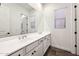 Clean bathroom with double vanity and white cabinets at 9539 W Villa Chula --, Peoria, AZ 85383