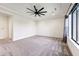 Bright bedroom featuring a ceiling fan and ample natural light at 9539 W Villa Chula --, Peoria, AZ 85383