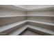Walk-in pantry with extensive shelving for storage at 19617 N 39Th Dr, Glendale, AZ 85308
