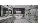 Spa-like bathroom with freestanding tub, walk-in shower, and modern vanity at 19617 N 39Th Dr, Glendale, AZ 85308