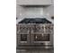 Stainless steel professional range with griddle at 19617 N 39Th Dr, Glendale, AZ 85308
