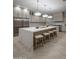 Modern kitchen with large island and stainless appliances at 19617 N 39Th Dr, Glendale, AZ 85308
