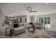 Spacious living room with a large sectional sofa and modern decor at 19617 N 39Th Dr, Glendale, AZ 85308