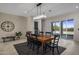 Bright dining room with sliding doors leading to the backyard at 19617 N 39Th Dr, Glendale, AZ 85308