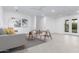 Living room with gray sofa and mid-century modern chairs at 2325 N 64Th St, Scottsdale, AZ 85257