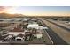 Luxury estate home situated on an airfield, featuring a private hangar at 21868 E Stacey Rd, Queen Creek, AZ 85142