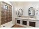 Spa-like bathroom with double vanity and walk-in shower at 21868 E Stacey Rd, Queen Creek, AZ 85142