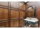 Upscale bathroom with wood paneling and ornate sink at 21868 E Stacey Rd, Queen Creek, AZ 85142
