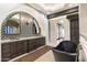 Spa-like bathroom with double vanity, large soaking tub, and elegant tilework at 21868 E Stacey Rd, Queen Creek, AZ 85142