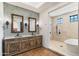 Bathroom with double vanity and large shower at 21868 E Stacey Rd, Queen Creek, AZ 85142