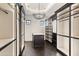 Large walk-in closet with custom shelving and lighting at 21868 E Stacey Rd, Queen Creek, AZ 85142