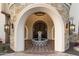 Elegant entryway with arched entry, fountain, and ornate tile at 21868 E Stacey Rd, Queen Creek, AZ 85142