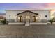 Stunning Spanish-style home with stone accents and a charming facade at 21868 E Stacey Rd, Queen Creek, AZ 85142