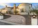 Luxury home with a curved driveway and beautiful landscaping at 21868 E Stacey Rd, Queen Creek, AZ 85142