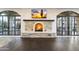 Elegant stone fireplace is the focal point of this spacious living room at 21868 E Stacey Rd, Queen Creek, AZ 85142