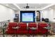 Game room with golf simulator and theater seating at 21868 E Stacey Rd, Queen Creek, AZ 85142