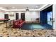 Game room features a golf simulator, pool table, and theater seating at 21868 E Stacey Rd, Queen Creek, AZ 85142