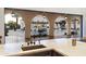 Kitchen with a copper farm sink, opens to a resort-style backyard at 21868 E Stacey Rd, Queen Creek, AZ 85142