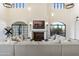 Bright living room featuring a sectional sofa and fireplace at 21868 E Stacey Rd, Queen Creek, AZ 85142
