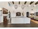 Living area with large sectional sofa, fireplace, and outdoor views at 21868 E Stacey Rd, Queen Creek, AZ 85142