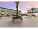 Luxury pool and spa with fire bowls and beautiful sunset views at 21868 E Stacey Rd, Queen Creek, AZ 85142