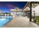 Outdoor entertaining area with pool, fire pits and seating at 21868 E Stacey Rd, Queen Creek, AZ 85142