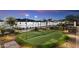 Landscaped putting green with basketball court nearby at 21868 E Stacey Rd, Queen Creek, AZ 85142
