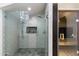 Spa-like shower with patterned tile and glass enclosure at 21868 E Stacey Rd, Queen Creek, AZ 85142