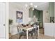 Bright dining area with a modern kitchen and stylish light fixture at 7350 N Via Paseo Del Sur -- # P202, Scottsdale, AZ 85258