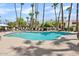 Community swimming pool with plenty of lounge chairs at 7350 N Via Paseo Del Sur -- # P202, Scottsdale, AZ 85258