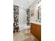 Updated bathroom with a bathtub and floral shower curtain at 7350 N Via Paseo Del Sur -- # P202, Scottsdale, AZ 85258
