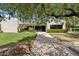 Building exterior showcasing a stucco facade and landscaping at 7350 N Via Paseo Del Sur -- # P202, Scottsdale, AZ 85258