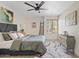 Spacious bedroom with queen bed, ceiling fan, and stylish decor at 7350 N Via Paseo Del Sur -- # P202, Scottsdale, AZ 85258