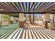Community pool area with pergola and putting green at 7350 N Via Paseo Del Sur -- # P202, Scottsdale, AZ 85258