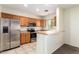 Kitchen with breakfast bar and stainless steel appliances at 15818 N 25Th St # 112, Phoenix, AZ 85032