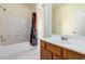 Clean bathroom, featuring a shower/tub combo and wood vanity at 15818 N 25Th St # 112, Phoenix, AZ 85032